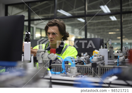 He designed precision in Mechanical Engineering.Close-up Shot of the Industrial Engineer 98521721