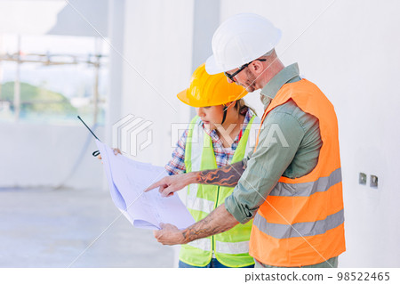 engineer worker team builder working together teamwork talking together work at construction site engineer worker team builder working together teamwork talking together work at construction site 98522465