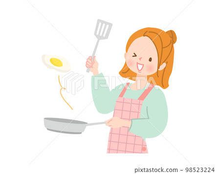 做煎蛋的年輕女人 做煎蛋的年輕女人 98523224