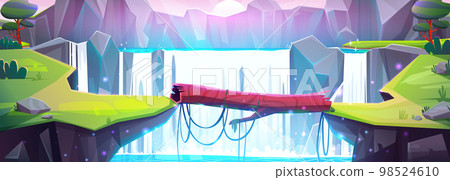 Log bridge across river between cliffs, waterfall 98524610