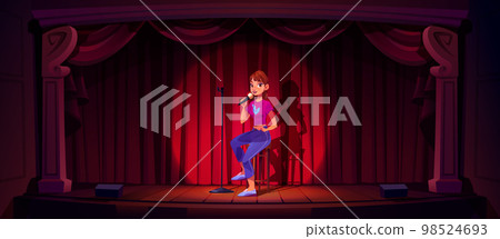 Comedian girl with mic on stage Comedian girl with mic on stage 98524693