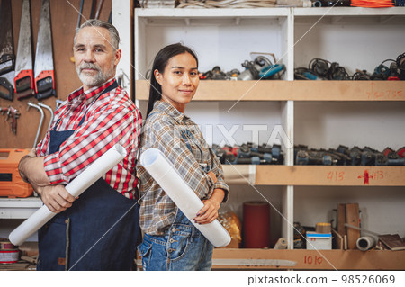 couple portrait wood workshop family worker standing happy smile for home renovate plan project service 98526069
