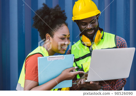 African worker people teamwork happy working together in port cargo shipping industry loading container yard African worker people teamwork happy working together in port cargo shipping industry loading container yard 98526090