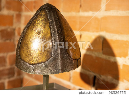 Protective headdress of the Middle Ages Norman helmet, close-up Protective headdress of the Middle Ages Norman helmet, close-up 98526755