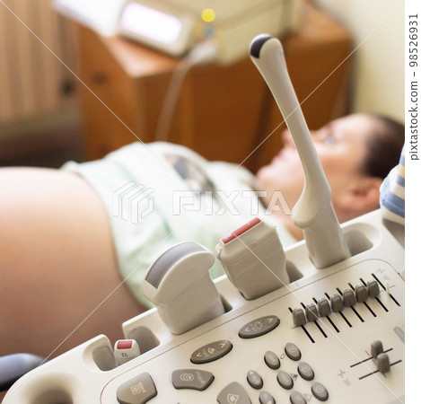 Medical ultrasound examination of the fetus of a pregnant girl. Fetal presentation, fetometry, cord entanglement, and placental maturity. Medical ultrasound examination of the fetus of a pregnant girl. Fetal presentation, fetometry, cord entanglement, and placental maturity. 98526931