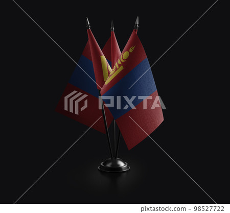 Small national flags of the Mongolia on a black background 98527722