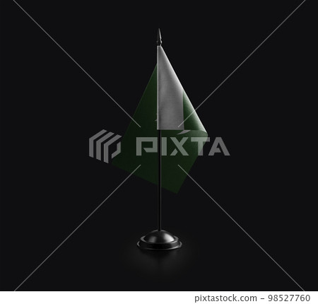 Small national flag of the Pakistan on a black background 98527760
