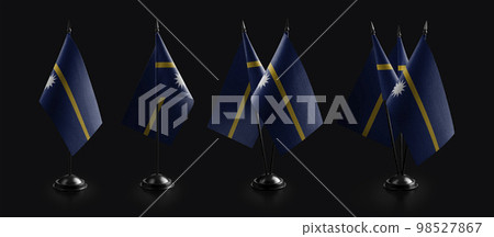 Small national flags of the Nauru on a black background Small national flags of the Nauru on a black background 98527867