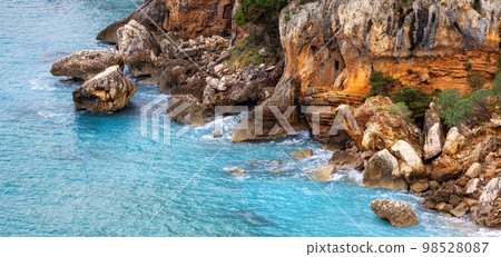 Rocky coast near Cala Gonone, Sardinia. Nature Background Rocky coast near Cala Gonone, Sardinia. Nature Background 98528087