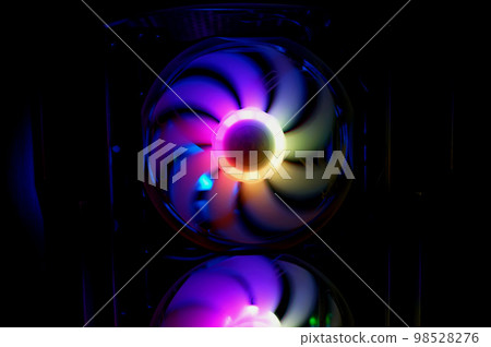 Colorful bright rainbow led rgb pc fan air case cooler. Computer chassis. Gaming modding, technology concept and IT background. 98528276