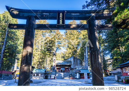 Nikko Toshogu shrine in sunny winter, approach and torii, Nikko City, Tochigi Prefecture 98528724
