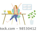 A woman taking a break at home work 98530412