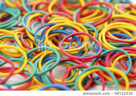 Multicolored elastic rubber bands close up Multicolored elastic rubber bands close up 98532016