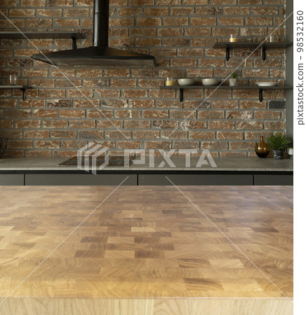 Wood table top on blur kitchen room Wood table top on blur kitchen room 98532160