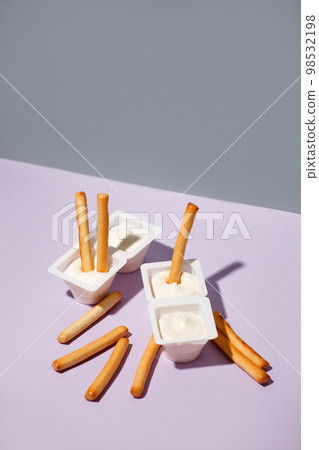 Minimal concept of food and dessert. flat lay, top view. Marshmellow and breadsticks, sweet street snack. Tredy color, hard shadow, menu for cafe, copy space, flyer, banner Minimal concept of food and dessert. flat lay, top view. Marshmellow and breadsticks, sweet street snack. Tredy color, hard shadow, menu for cafe, copy space, flyer, banner 98532198