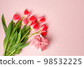 Colorful pink tulips and gift box with copy space. Background for womens day, 8 March, Valentines day, Saint Valentine 14 february. Flat lay, Greeting card, banner, invitation, flyer, discount 98532225