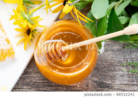 fresh honey with honeycombs fresh honey with honeycombs 98532241