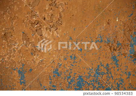 Texture of a rusty iron surface with peeling paint. Texture of a rusty iron surface with peeling paint. 98534383