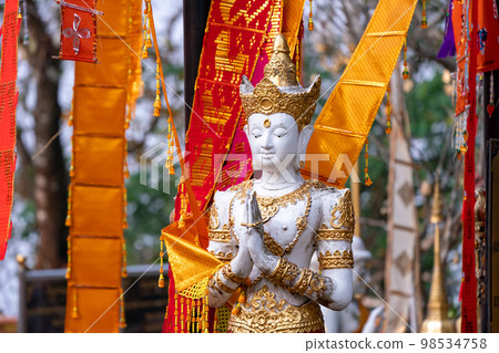 Asia Angel Statue in front of Tung Tree, Traditional Believe of the Victory and Brightness in that area, Wat Phra That Doi Tung, Famous Place in North of Thailand. 98534758