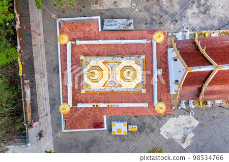 Wat Phra That Doi Tung from above birdeyes view, a famous Temple and Buddhism place. It's settled on the mountain in Chiang Rai province, north of Thailand. 98534766