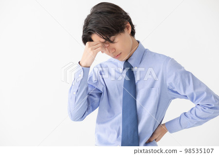 Businessman headache worry tired 98535107