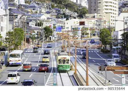 Nagasaki's townscape with a tram convenient for sightseeing 98535644