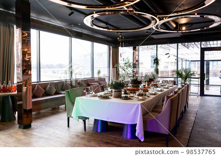 wedding festive table in a restaurant with food and decor wedding festive table in a restaurant with food and decor 98537765