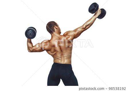 Back view of athletic muscular man who doing exercises with dumbbells on white background Back view of athletic muscular man who doing exercises with dumbbells on white background 98538192