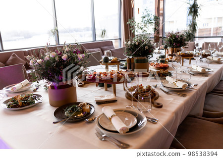 food and drinks on the table in the restaurant on the wedding day luxury 98538394