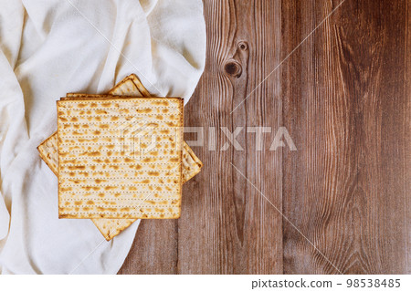 Pesah is Jewish tradition that celebrates Passover holiday with Matzoh kosher unleavened bread 98538485
