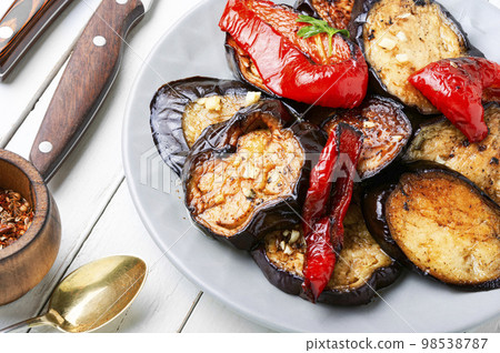 Grilled juicy vegetables on a plate. Grilled juicy vegetables on a plate. 98538787