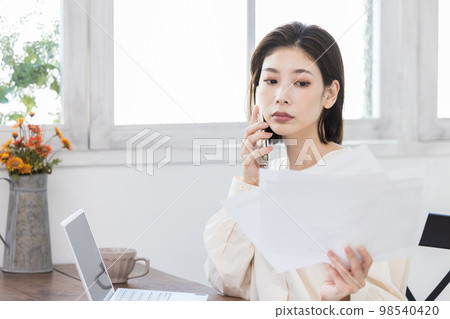 Woman doing telework 98540420