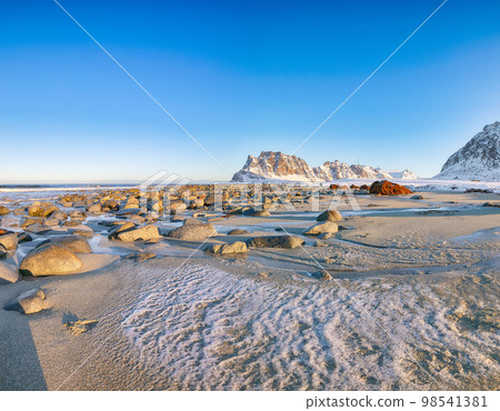 Gorgeous winter scenery on Uttakleiv beach at morning Gorgeous winter scenery on Uttakleiv beach at morning 98541381