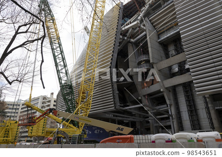 Santiago Bernabeu. Exterior of the Santiago Bernabeu stadium in full works and renovation of the venue where Real Madrid C.F. Football field. Field full of machines. MADRID, SPAIN - JANUARY 24, 2023. 98543651