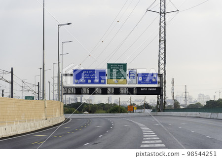 Jerusalem direction sign on Highway 1 in Tel Aviv, Israel Blue road sign for Ben Gurion Airport Exit to the first highway. Jerusalem direction sign on Highway 1 in Tel Aviv, Israel Blue road sign for Ben Gurion Airport Exit to the first highway. 98544251