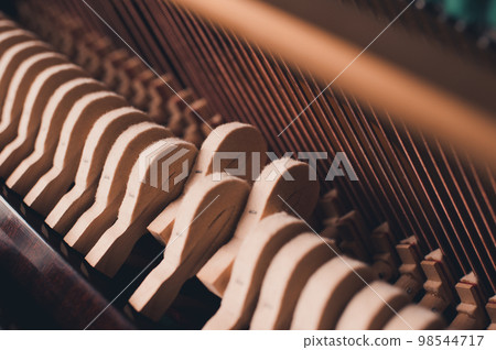 Tuning piano with strings and hammers Tuning piano with strings and hammers 98544717