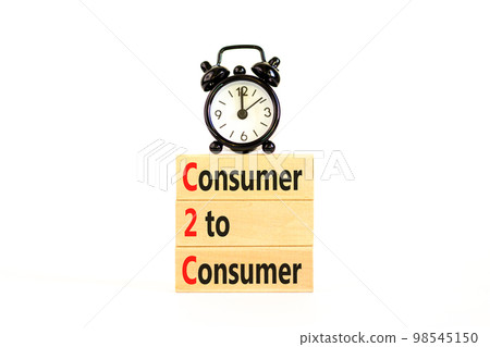 C2C consumer to consumer symbol. Concept words C2C consumer to consumer on wooden blocks on a beautiful white table white background. Business and C2C consumer to consumer concept. Copy space. 98545150