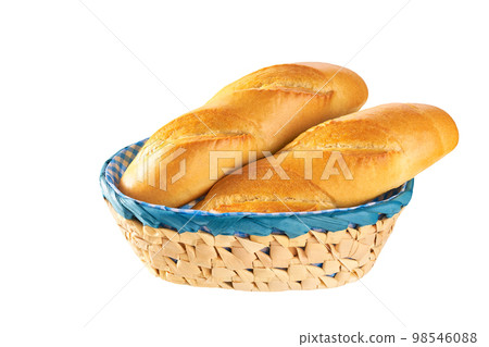 Fresh french bread in basket isolated on white background with clipping path. Fresh french baguette in basket isolated. Fresh french bread in basket isolated on white background with clipping path. Fresh french baguette in basket isolated. 98546088