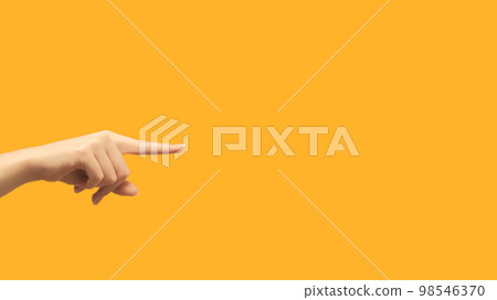 Finger pointing. Advertising background. Offer promotion. Female hand showing recommending something invisible on orange copy space. Finger pointing. Advertising background. Offer promotion. Female hand showing recommending something invisible on orange copy space. 98546370