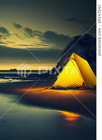 Illuminated yellow tent wild camping in the mountains under night sky 98547642