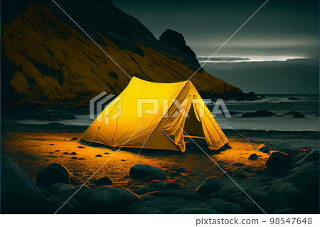 Illuminated tent wild camping in the mountains under night sky Illuminated tent wild camping in the mountains under night sky 98547648