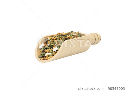 Green tea Japanese Genmaicha. Green tea mixed with roasted popped brown rice  in wooden scoop isolated on white background. 98548003