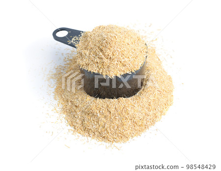 Oats miller's bran isolated on white background Oats miller's bran isolated on white background 98548429