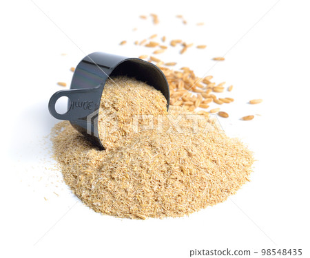 Oats miller's bran with grains isolated on white background Oats miller's bran with grains isolated on white background 98548435