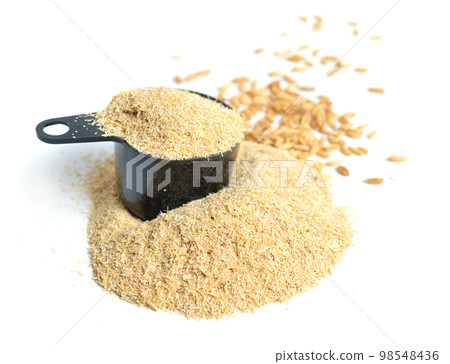 Oats miller's bran with grains isolated on white background Oats miller's bran with grains isolated on white background 98548436