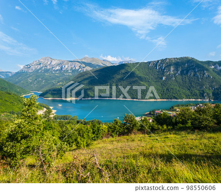 Piva Lake (Pivsko Jezero) and Pluzine town view in Montenegro. 98550606