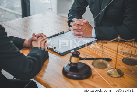 Law theme, mallet of the judge, law enforcement officers, evidence-based cases, and documents taken into account.. Law theme, mallet of the judge, law enforcement officers, evidence-based cases, and documents taken into account.. 98552481