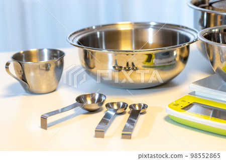Various kitchen utensils on the table 98552865