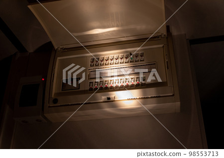 Circuit board breaker illuminated by flashlight 98553713