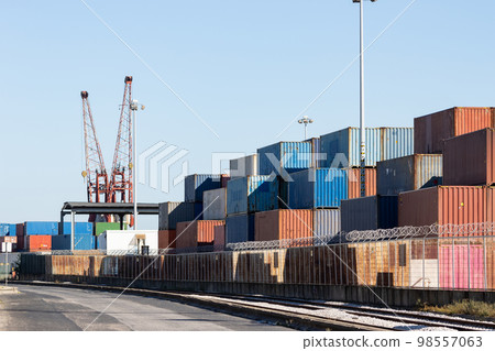 Many colorful cargo containers in the seaport Many colorful cargo containers in the seaport 98557063